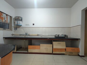 Kitchen in 3 BHK Apartment at Ramdev Nagar – for Sale