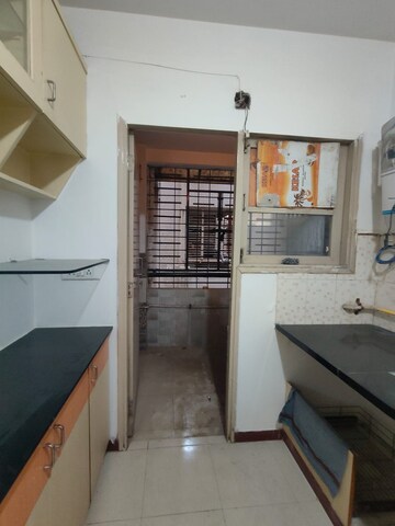 Kitchen in 3 BHK Apartment at Ramdev Nagar – for Sale