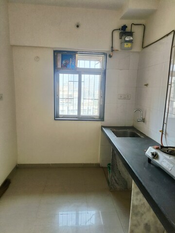 Kitchen in 1 BHK Apartment at Vihang Valley Phase 2, Kasarvadavali – for Sale