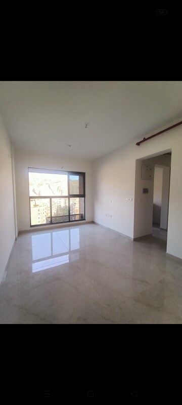Living Room in 1 BHK Apartment at Godrej Urban Park, Chandivali – for Rent