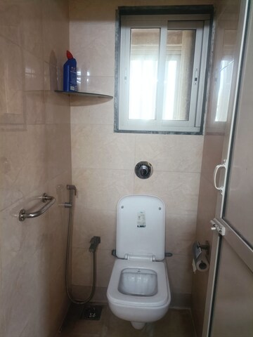 Bathroom in 1 BHK Apartment at Eden Woods complex, Manpada – for Rent