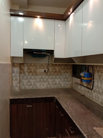 Kitchen in 2 BHK Builder Floor at Dwarka Mor – for Sale