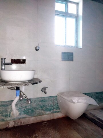 Bathroom in 3 BHK Builder Floor at Em Bypass – for Sale