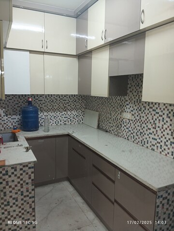 Kitchen in 1.5 BHK Builder Floor at Shalimar Garden – for Sale