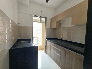 Kitchen in 2 BHK Apartment at RNA NG Canary, Mira Road – for Sale