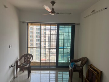 Living Room in 2 BHK Apartment at RNA NG Canary, Mira Road – for Sale