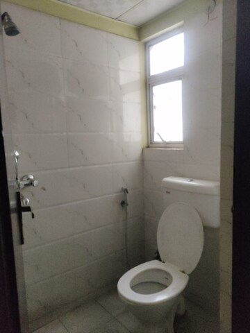Bathroom in 2 BHK Apartment at Panchsheel Greens, Sector 16 Greater Noida – for Rent