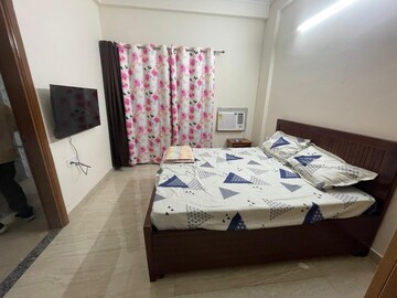 Bedroom in 1 BHK Builder Floor at DLF Exclusive Floors, Sector 53 – for Rent