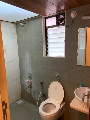 Bathroom in 2 BHK Apartment at Kabra Paradise, Andheri West – for Sale