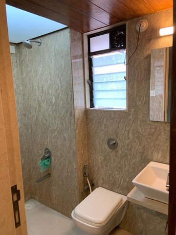 Bathroom in 2 BHK Apartment at Kabra Paradise, Andheri West – for Sale