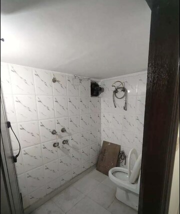 Bathroom in 3 BHK Builder Floor at Mehrauli Gurgaon Road – for Rent
