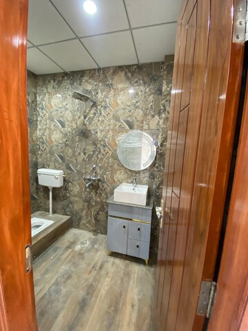 Bathroom in 3 BHK Builder Floor at Soho Apartments, Shakti Khand – for Sale