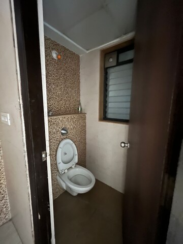 Bathroom in 2 BHK Apartment at Lodha Palava City Lakeshore Greens, Dombivli East – for Rent