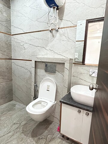 Bathroom in 2 BHK Builder Floor at Aman Luxury Apartments, Sahastradhara Road – for Rent