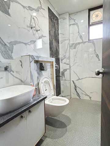 Bathroom in 2 BHK Builder Floor at Aman Luxury Apartments, Sahastradhara Road – for Rent