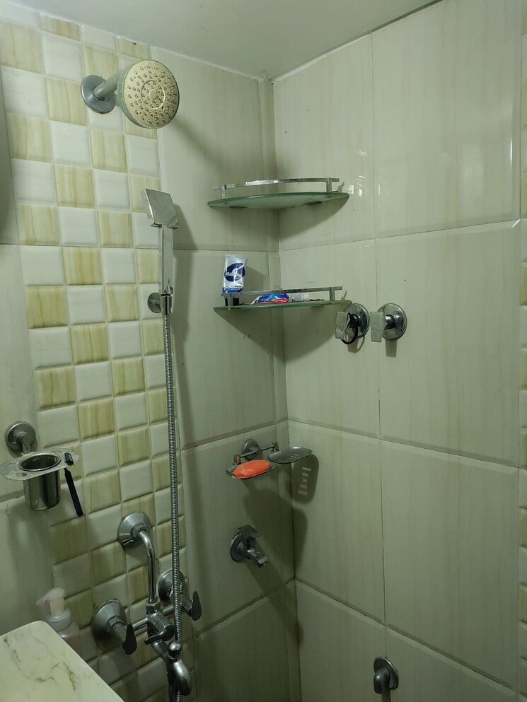 Bathroom, om-shree-laxmi-tower 1 Bedroom 570 Sq.Ft. Apartment In Uthalsar Thane 8225861