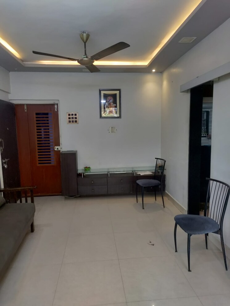 Living Room, om-shree-laxmi-tower 1 Bedroom 570 Sq.Ft. Apartment In Uthalsar Thane 8225861