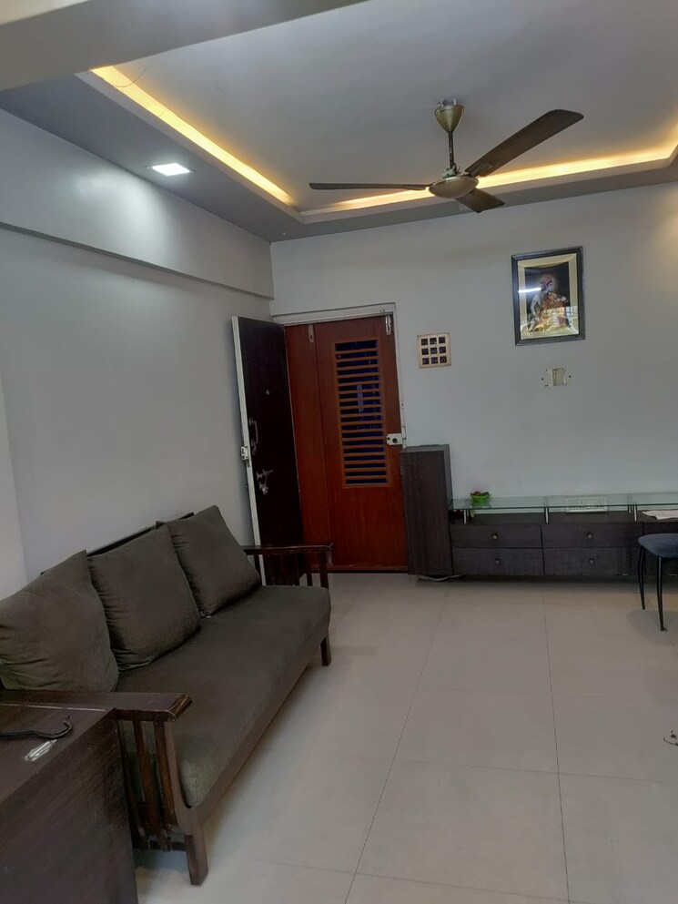 Living Room, om-shree-laxmi-tower 1 Bedroom 570 Sq.Ft. Apartment In Uthalsar Thane 8225861