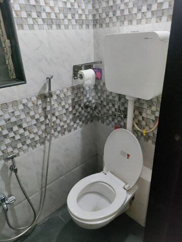 Bathroom in 1 BHK Apartment at Om Shree Laxmi Tower, Uthalsar – for Sale