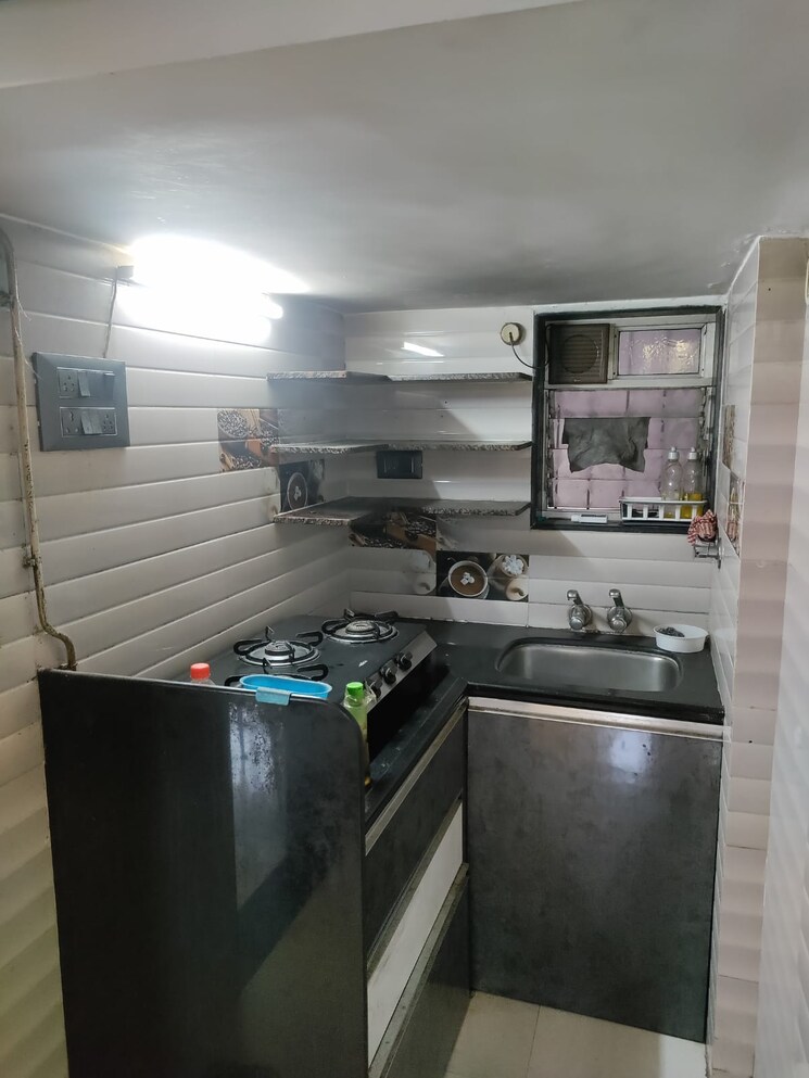 Kitchen, om-shree-laxmi-tower 1 Bedroom 570 Sq.Ft. Apartment In Uthalsar Thane 8225861