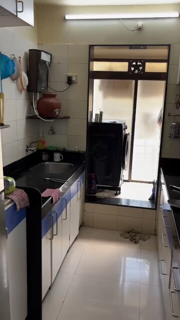 Kitchen in 2 BHK Apartment at KP Krishna Regency, Malad West – for Sale