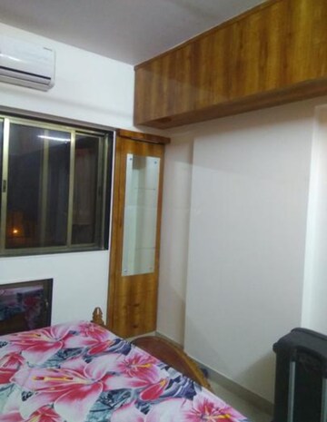 Bedroom in 2 BHK Apartment at Runwal Garden City, Balkum Pada – for Rent