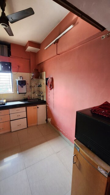 Kitchen in 3 BHK Apartment at Cosmos Tower, Majiwada – for Rent
