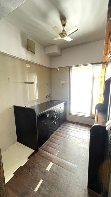 Kitchen in 2 BHK Apartment at Unique Signature Mumbai, Mira Road – for Rent