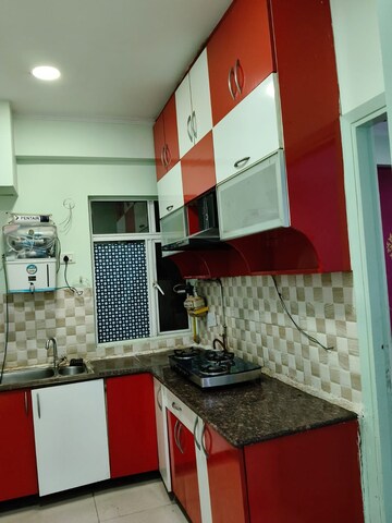 Kitchen in 2 BHK Apartment at Amrapali Golf Homes, Sector 4, Greater Noida – for Sale