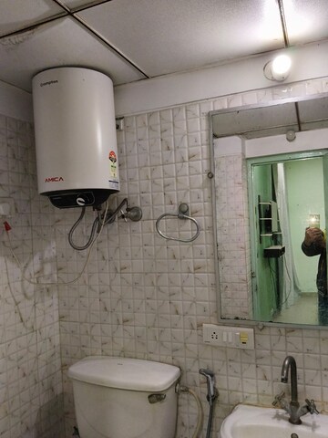 Bathroom in 2 BHK Apartment at Amrapali Golf Homes, Sector 4, Greater Noida – for Sale
