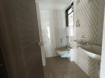 Bathroom in 2 BHK Apartment at Rustomjee Global City – for Sale