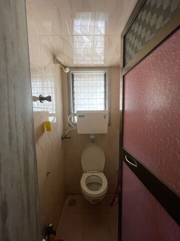 Bathroom in 1 BHK Apartment at Ashokvan Apartments, Dahisar East – for Rent