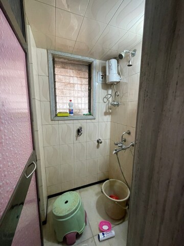 Bathroom in 1 BHK Apartment at Ashokvan Apartments, Dahisar East – for Rent