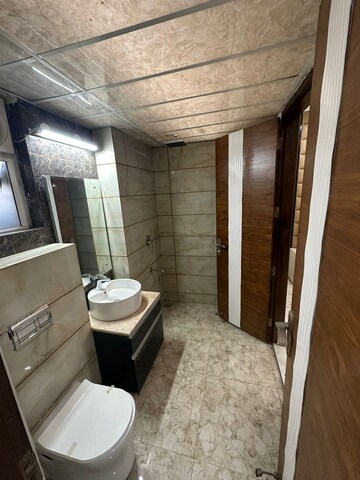 Bathroom in 4 BHK Apartment at Meenal Semeion, Sector 41 – for Sale