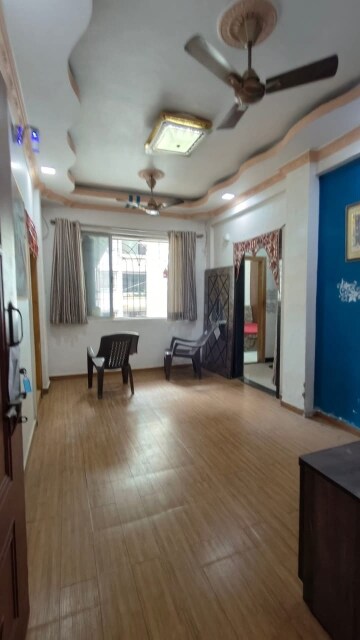 Living Room in 1 BHK Apartment at Evershine Harmony, Vasai East – for Sale