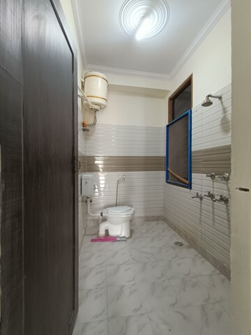 Bathroom in 2 BHK Builder Floor at Khirki Extension – for Rent