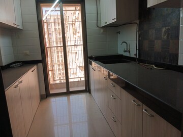 Kitchen in 1 BHK Apartment at Madhav Palacia, Ghodbunder Road – for Rent