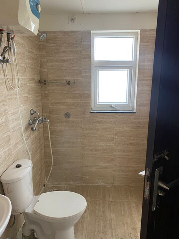 Bathroom in 4 BHK Apartment at BPTP Parkland Pride, Sector 77 – for Sale