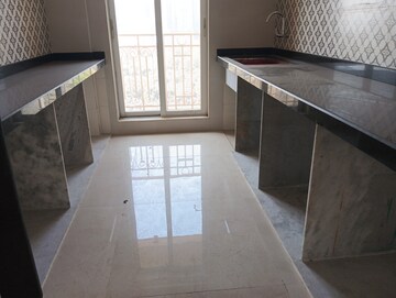 Kitchen in 2 BHK Apartment at Shree Tirupati STG Signature Residency, Ghodbunder Road – for Rent