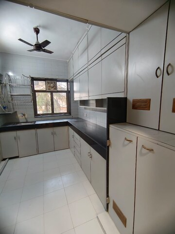 Kitchen in 2 BHK Apartment at PR Prahlad B, Santacruz West – for Rent
