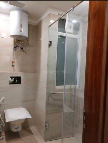 Bathroom in 4 BHK Apartment at Ambience Caitriona, Sector 24 – for Sale