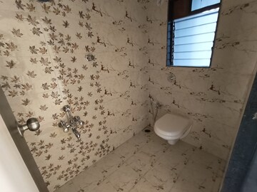 Bathroom in 1 BHK Apartment at Rustomjee Global City – for Sale