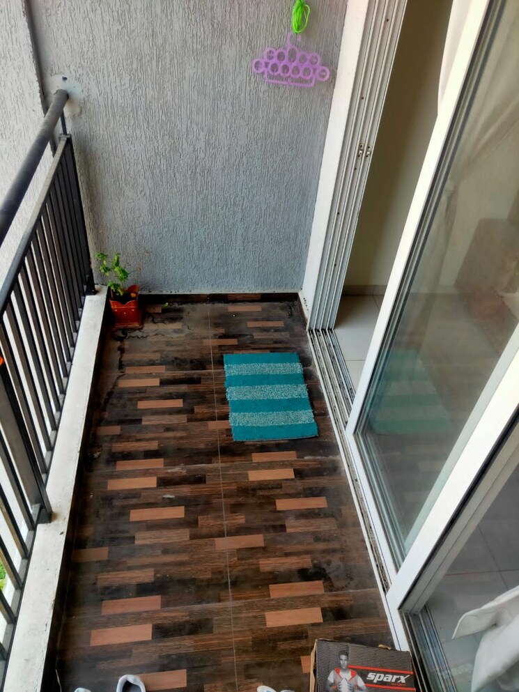 Balcony, kolte-patil-life-republic 2 Bedroom 801 Sq.Ft. Apartment In Hinjewadi Pune 8227590