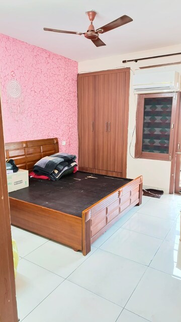 Bedroom in 2 BHK Builder Floor at Dhakoli Village – for Sale