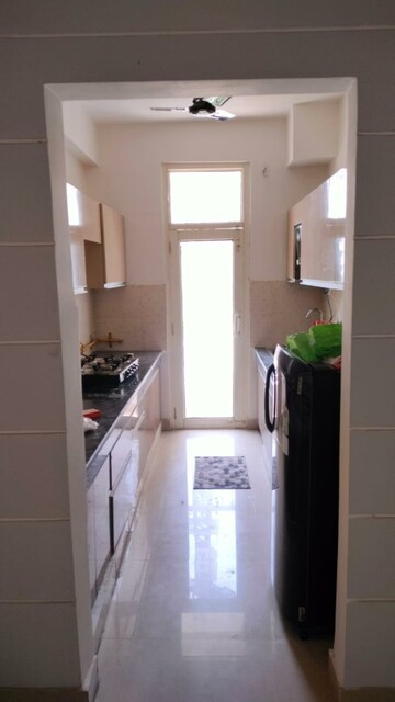Kitchen in 3 BHK Apartment at Proview Officer City 2, Raj Nagar Extension – for Rent