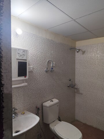 Bathroom in 2.5 BHK Apartment at Aims Golf City, Sector 75 – for Rent