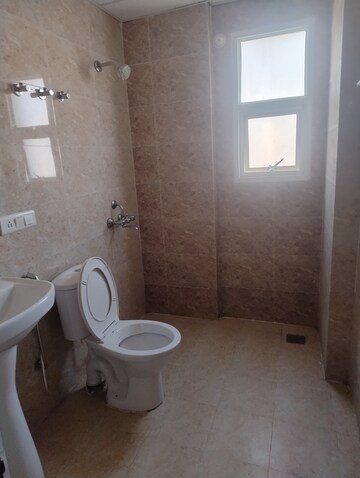 Bathroom in 3 BHK Apartment at Rishita Manhattan, Gomti Nagar – for Rent