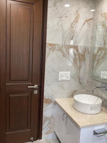 Bathroom in 3 BHK Builder Floor at Ansal Sushant Lok I, Sector 43 – for Rent