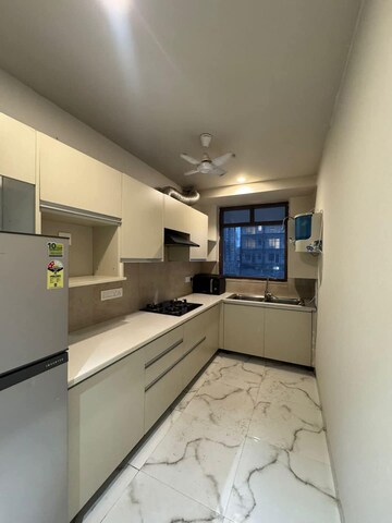 Kitchen in Studio Builder Floor at Unitech Infospace, Sector 21 – for Rent