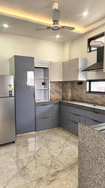 Kitchen in 2 BHK Apartment at Raja Park – for Rent
